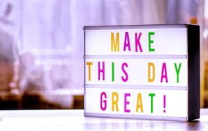 Sign that says 'Make this day great"