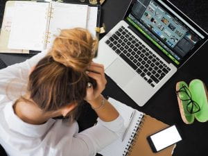 Women stressed at computer